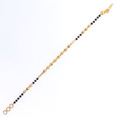 This stylish 22k gold bracelet, weighing 4.5 grams, features brilliant black beads that enhance its radiant yellow gold finish. The 7-inch length, paired with adjustable 0.6-inch links, ensures a comfortable and secure fit. Secured with a hook lock, this bracelet offers a chic and sophisticated look, making it a perfect accessory for both everyday wear and special occasions. PRODUCT DETAILS Gold Purity(karat): 22k Item Weight(grams): 4.5 Item Finish: Yellow Gold Stone: Black Bead Bracelet Length Black Bead Bracelet, 22k Gold Bracelet, Bridal Jewelry Necklace, Precious Stones Rings, Diamond Pendant Sets, Black Beaded Bracelets, Modern Bracelets, Fancy Necklace, Fancy Rings