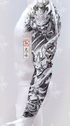 a woman's arm with tattoos on it and snowflakes in the background