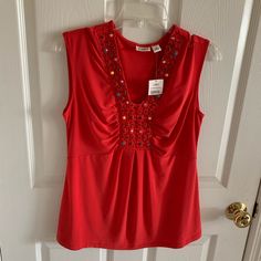 Fun Sequined And Beaded V Neck Sleeveless Top. Bright Red Color, Seam That Runs Dividing The Top And Bottom Of The Shirt For Waist Definition And Ruching Around The Chest. Size Small From Cato. Nwt. Inventory: Q, B82 Red Stretch Sleeveless Blouse, Chest Size, Bright Red, Red Color, Nice Dresses, Sleeveless Top, Womens Tops, V Neck, Tank Tops