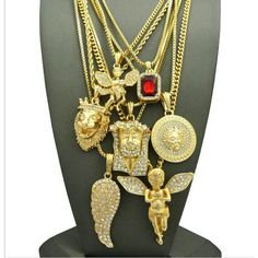 14k Gold Plated 7 Chain Combo Iced Out Ruby Wing Medusa King Leo 24" 30" Diamond Pendant Necklace With Box Chain, Yellow Gold Pendant Chain Jewelry, Gold-tone Cuban Link Chain With Adjustable Detail, Gold-tone Cuban Link Jewelry With Adjustable Chain, Gold-tone Jewelry With Gold Chain For Jewelry Making, Yellow Gold Plated Jewelry With Rope Chain, Gold-tone Rope Chain Jewelry For Formal Occasions, Gold Plated Box Chain Pendant Jewelry, Fine Jewelry Cuban Link With Adjustable Chain