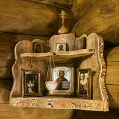 a wooden shelf with pictures on it