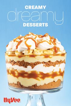 there is a cake with caramel sauce and whipped cream on top in a glass dish