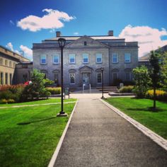 a large building with a walkway leading to it