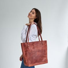 "Genuine leather minimalist messenger bag for women. Zipper closure and shoulder straps.  DIMENSIONS: Size S 29.2 x 33 x 25.4 cm 11.5 x 13 x 10\"\" Size M 30.4 x 38 x 26.6 cm 12 x 15 x 10.5\"\" Size L 30.4 x 45.7 x 27.9 cm 12 x 18 x 11\"\" Size XL 33 x 53.3 x 34.2 cm 13 x 21 x 13.5'' Length of shoulder straps - 27.9 cm / 11\" Eight colors are available. Your item may be personalized according to your wish. See the banners for more information." Minimalist Satchel Bag With Leather Lining, Minimalist Shoulder Bag With Leather Lining For Daily Use, Minimalist Rectangular Shoulder Bag With Leather Lining, Brown Minimalist Shoulder Bag With Leather Lining, Minimalist Satchel Shoulder Bag With Leather Lining, Minimalist Leather Shoulder Bag With Leather Handles, Minimalist Leather-lined Satchel Shoulder Bag, Minimalist Brown Leather Shoulder Bag, Minimalist Leather Satchel For Everyday Use