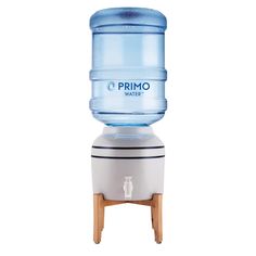 a large water bottle dispenser sitting on top of a wooden stand