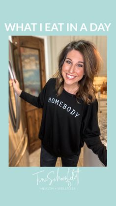 a woman standing in front of a refrigerator with the words, what i eat in a day