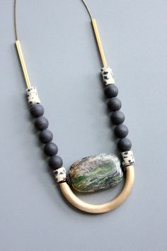 22” necklace with jasper, brass, and glass. 1 inch extender. Brass Necklaces With Round Natural Stone Beads, Brass Round Beads Necklace With Natural Stones, Brass Necklace With Round Natural Stone Beads, David Aubrey Jewelry, Adjustable Earthy Jasper Necklaces, Adjustable Earthy Jasper Necklace, Unique Jasper Gold Necklace, Unique Gold Jasper Necklace, Unique Brass Necklaces With Round Beads