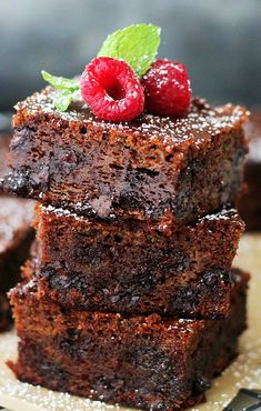 chocolate brownies with raspberries and mint on top