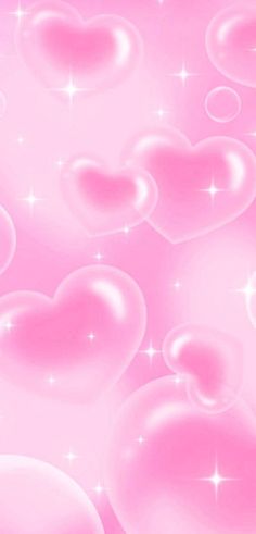 pink hearts are floating in the air