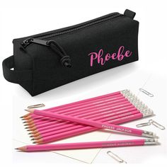 "Personalised Black Block Style Pencil Case printed with with 12 HB Pencils with Erasers. Our pencils are made to a high standard in Germany and printed in the UK. This set makes a great personalised gift that will delight any age for any occasion. Stylish, high quality European designed pencil case is printed in colours to match the pencils. See images for our great choice of fonts Pencil names are printed in Silver block capitals. One line of text with up to 30 characters, all pencils need to Pink Pencil Stationery For School, Pink Stationery With Pen Slots, Pink Pencil Stationery For Back To School, Black Pencil Stationery For School, Black Pencil Stationery For Personal Use, Pencil-shaped Pen Holder For Personal Use, Black Stationery Gift For Back To School, Black Stationery For Back To School Gift, Educational Pink Pencil Craft Supplies