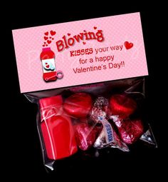 valentine's day candy in a bag with the message blowing kisses your way for a happy valentine's day