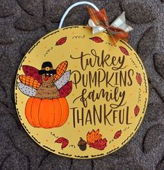 a wooden sign that says turkey pumpkins family thanksgiving