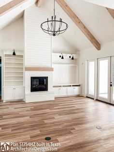 an empty living room with wood flooring and open doors to the front porch area