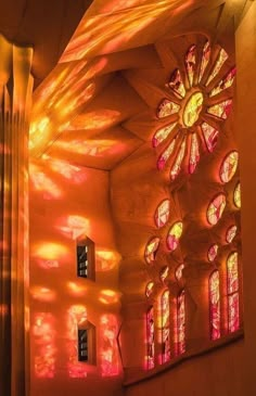 the light is shining through the windows in this church's interior, and it appears to be brightly colored