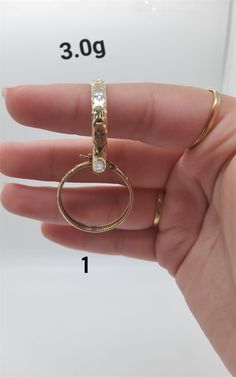 A 10k hoop earrings is a versatile piece of jewelry that blends durability with elegance. Perfect gift for any occasion. 14k Gold Hinged Hoop Jewelry, Hinged 14k Gold Round Jewelry, Fine Jewelry Hinged Gift, Round Hinged 14k Gold Jewelry, Hinged Round 14k Gold Jewelry, Gift Round Huggie Earrings, Anniversary Hinged Huggie Hoop Earrings, Tarnish Resistant Round Huggie Earrings As Gift, Yellow Gold Hoop Jewelry Gift