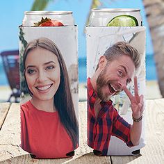 two beer cans, one with a photo and the other with a slice of fruit