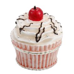 a cupcake with white frosting and a cherry on top is shown in front of a white background