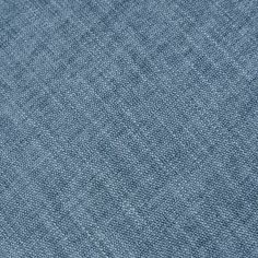 a blue fabric textured with small squares