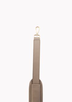 Our versatile and stylish cross body strap is the perfect accessory for any busy mom on the go! With an adjustable length of 40-50 inches, this strap can be worn comfortably across your body, providing a hands-free option for carrying your bag. Featuring a padded shoulder strap for added comfort, this cross body strap is both durable and stylish. And while it is the perfect match for our Radley bag, it can also be mixed and matched with any bag that has D-Rings available, making it a versatile a Beige Crossbody Shoulder Strap For Everyday, Everyday Beige Crossbody Shoulder Strap, Adjustable Versatile Bag Strap For Travel, Adjustable Detachable Strap Shoulder Strap For Everyday Use, Versatile Adjustable Shoulder Strap For Daily Use, Adjustable Detachable Shoulder Strap For Everyday, Versatile Adjustable Bag Strap For Daily Use, Adjustable Beige Bag Strap For Everyday, Versatile Detachable Shoulder Strap For Everyday