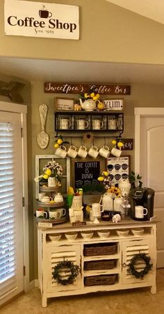 the coffee shop is decorated with yellow and white flowers, wreaths, and other items