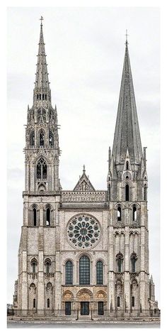 the large cathedral has two spires on it's sides and is very ornate