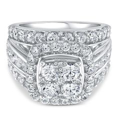 a white gold ring with three rows of diamonds on the sides and two rows of round cut