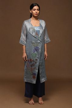 Blue grey jacket with applique work floral motifs and overlap layer. Paired with linen satin bustier and contrast pant.
Component: 3
Pattern: Applique
Type Of Work: Floral
Neckline: Jacket: Mandarin collar
Sleeve Type: Jacket: Three-quarter
Fabric: Jacket: Handloom tissue silk, Bustier: Linen satin, Pant: Linen satin
Color: Blue
Other Details: 
Floral motifs
Overlap layer
Closure
Jacket: Front button
Contrast pant
Occasion: Resort, Work - Aza Fashions Satin Bustier, Applique Work, Satin Pants, Greyish Blue, Silk Linen, Floral Jacket, Indian Fashion Designers, Satin Color, Silk Jacket