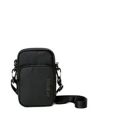 Get the Deets: 8" tall x 5" wide x 2" deep Main compartment: 5 W x 8 H Front pocket: 5 W x 6 H Main compartment holds up to 3 L. Two separate carrying compartments. Front pocket includes an elastic key/wallet clip. Removable, adjustable shoulder strap with swivel clips. Interior pockets, including phone sleeve (fits any size phone). Multiple interior elastic organizational slots for pens, lip balm and other small essentials. Matching zipper pulls & main compartment liner. Basic Black Functional Black Crossbody Phone Bag, Black Crossbody Mobile Phone Pouch, Black Functional Phone Bag For Travel, Functional Black Phone Bag For Travel, Black Phone Bag With Zipper Pocket Crossbody, Black Shoulder Phone Bag With Zipper Pocket, Black Phone Shoulder Bag With Zipper Pocket, Black Phone Bag With Zipper Pocket, Functional Black Pouch With Zipper Pocket