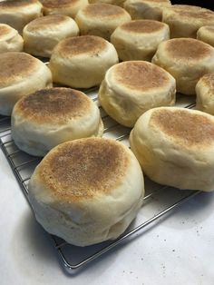 freshly baked rolls cooling on a wire rack