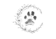 a black and white drawing of a bear's paw in a circle with flowers