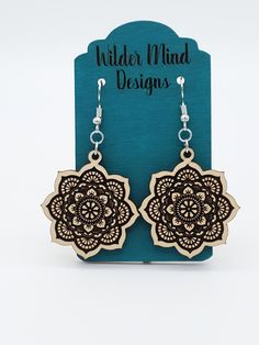 Laser Engraved Mandala Wood Earrings. These earrings are beautiful and can go with any outfit, they are very lightweight- making them easy to wear all day! They are made from Basswood Plywood and lightweight and durable. These earrings are laser cut and laser engraved. Ear wires are made from surgical stainless steel. Since these earrings are made from wood, I highly recommend taking them off for any water related activities such as swimming or showering. They come packed on an earring card hold Bohemian Flower Shaped Earrings With Ear Wire, Flower Earrings With Ear Wire For Festivals, Bohemian Adjustable Flower-shaped Earrings, Bohemian Adjustable Flower Shaped Earrings, Flower-shaped Matching Earrings For Festivals, Bohemian Flower-shaped Pierced Earrings, Flower-shaped Jewelry With Matching Earrings For Festivals, Bohemian Single Flower Earring, Earrings Drawing