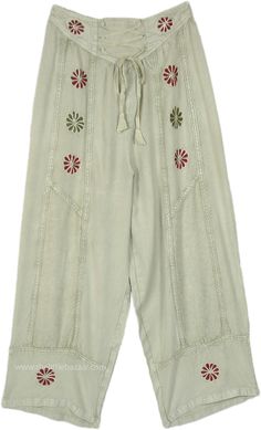 Free-flowing stonewashed straight-leg pants are perfect for any season. They impart effortless style with floral embroidery in burgundy and dark green. #tlb #SplitSkirtsPants #Stonewash #Embroidered #Misses #Pocket #Summerpants #greenpants #greenstreetpants Bohemian Wide-leg Pants With Floral Embroidery, Bohemian Harem Pants With Relaxed Fit, Bohemian Floral Embroidery Pants For Summer, Bohemian Harem Pants Straight Leg Relaxed Fit, Spring Embroidered Cotton Harem Pants, Bohemian Embroidered Beige Bottoms, Bohemian Cotton Pants With Floral Embroidery, Embroidered Cotton Harem Pants For Spring, Hippie Embroidered Bottoms For Summer