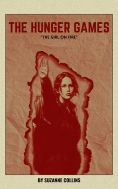 the book cover for the hunger games, featuring a woman holding her hand up in front of