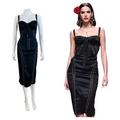 Gorgeous 2019 Dolce + Gabbana corset style dress (shown pinned to mannequin) Black silk + elastane fabric Bustier bra style bust with fitted + padded bust cups Wide adjustable shoulder straps Wiggle style fit with gold grommets + lacing details throughout Knee length tapered skirt Hidden zipper up the back Unlined Marked 42, fits a little larger possibly up to 44, Measurements: Bust 17.5-19 ", Waist 14-15", Hips 18-20", Length 44" Clean + ready to wear All sales are FINAL so please do not hesita Corset Style Dress, Tapered Skirt, Silk Corset, Corset Style Dresses, Dolce Gabbana Dress, Corset Lace, Bra Style, Dress Gold, Bustier Dress