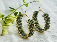 Miuyki seed beads  Gold Plated stainless 25mm hoop earrings Handmade Green Hoop Earrings For Gift, Handmade Green Beaded Hoop Earrings, Handmade Small Green Hoop Earrings, Green Round Jewelry With Tiny Beads, Green Jewelry With Tiny Beads, Green Hoop Beaded Earrings With Ear Wire, Green Hoop Beaded Earrings, Green Beaded Hoop Earrings With Ear Wire, Nickel Free Green Small Hoop Beaded Earrings