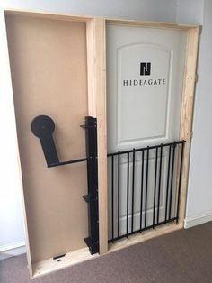 an open door with a black handle on it and a sign that reads hildegate