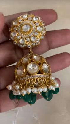 These earrings would have a luxurious, traditional jhumki design, combining modern moissanite brilliance with Kundan beauty. Desi Jewelry, Goddess Dress, Kundan Earrings, Finger Rings, Cz Earrings, Antique Earrings, American Diamond, Pendant Set, Designer Earrings