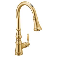 a golden faucet on a white background