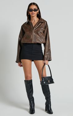 Get ready to turn heads in the Sophia Jacket - Crop Pu Bomber Jacket in Brown. This trendy piece is perfect for adding some edge to any casual outfit. Made from high-quality polyurethane, this jacket features a crop length and long sleeves, making it ideal for cooler weather. The rich brown color adds warmth and sophistication to your look, while the bomber style gives off an effortlessly cool vibe. Pair it with jeans and a t-shirt for an effortlessly chic ensemble or dress it up with a skirt and heels for a night out on the town. Whether you're hitting the streets or heading out on the town, this jacket will keep you looking stylish all day long.Product Details:Zips detailInner liningPU fabricCasual useCrop lengthLong sleevePolyurethane materialMaterial and Care100% PolyurethaneLow / No s Outfit Inspo Concert, Jacket Crop, Cropped Jackets, Casual Chic Outfits, Red Sequin Dress, Basic Black Dress, Neon Outfits, Spring Maxi Dress, Bachelorette Dress