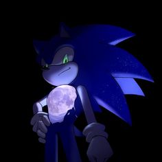 sonic the hedgehog holding a crystal ball in his hand