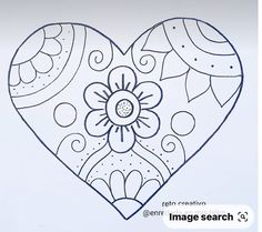 a drawing of a heart with flowers on it