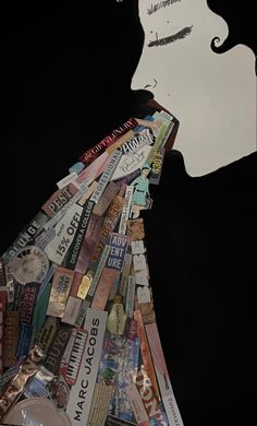 a woman's profile is made up of magazines