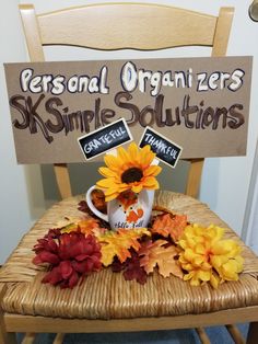 a wooden chair with a sign that says personal organizer's simple solutions