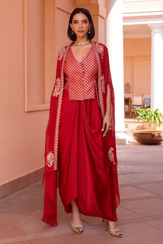 Buy Red Cape Organza Embroidery Tilla Cape Open Ratan Draped Skirt Set For Women by Isha Gupta Tayal Online at Aza Fashions. Red Designer Wear Set With Cape Sleeves, Red Designer Sets With Cape Sleeves, Traditional Red Sets With Cape Sleeves, Festive Red Sets With Cape Sleeves, Cape Organza, Isha Gupta, Waistcoat Pattern, Festive Outfits, Organza Suits