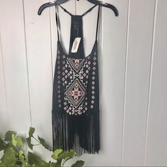 Cute Nwt Forever 21 Boho Top With Fringe, Racer Back With Adjustable Straps, Beautiful Embroidered Pattern, Fringe Hem, Please Refer To Photo Measurements For Accurate Sizing Mint Condition, Smoke Free Home Sku 11 Forever 21 Sleeveless Festival Tops, Forever 21 Bohemian Festival Tops, Bohemian Fringe Top For Night Out, Forever 21 Graphic Tees, White Halter Crop Top, Black And White Flannel, Sheer Floral Blouse, Red Pullover, Yellow Polka Dot