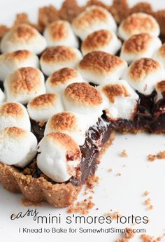 a chocolate pie with marshmallows on top