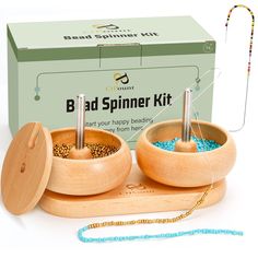 the bead spinner kit includes two wooden bowls with beads in them and a box behind it