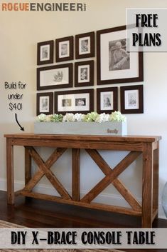 a console table with pictures on the wall and text overlay that says diy x - brace console table