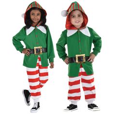 two children in elf costumes standing next to each other