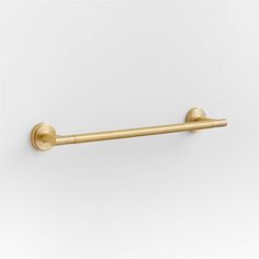 an image of a brass colored towel bar